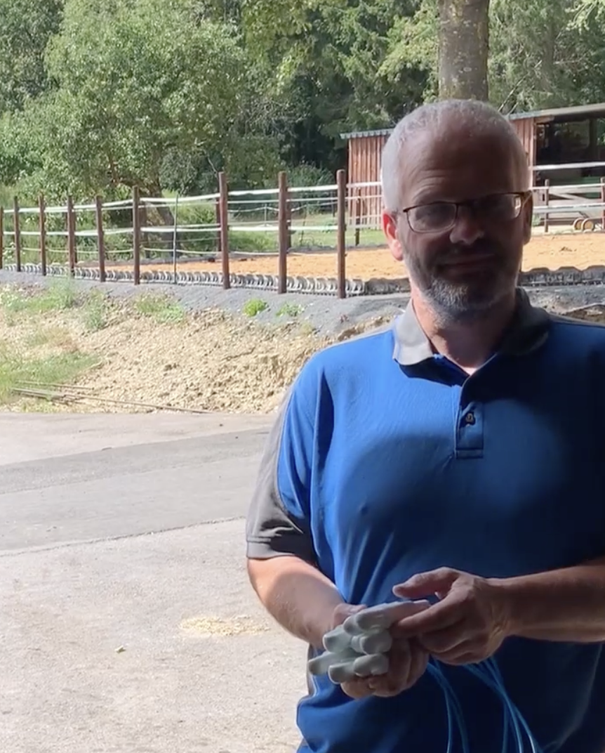 A dairy producer using wiCow on the farm